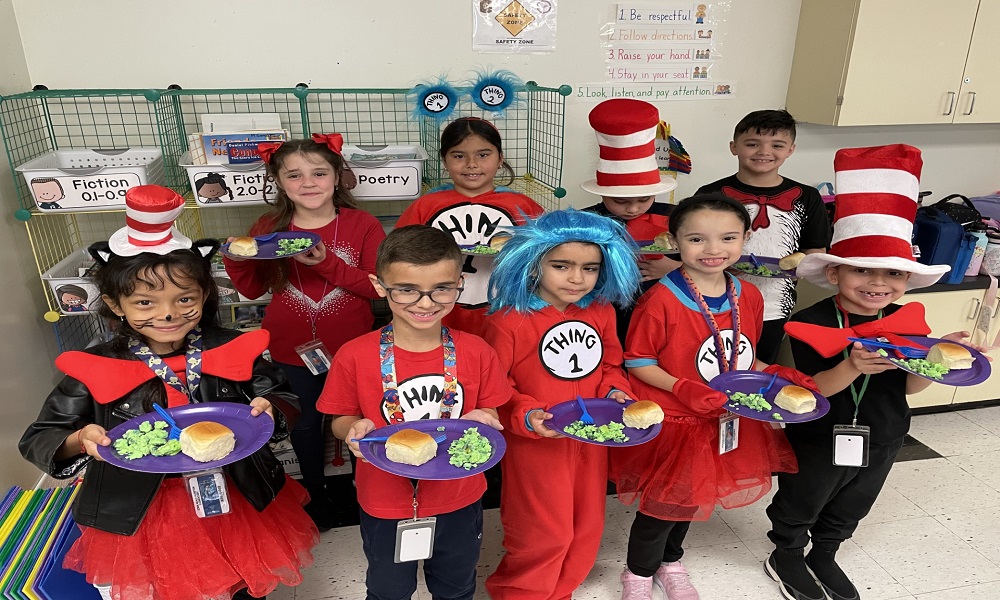 Students celebrating Dr Seuss Day with green eggs and ham